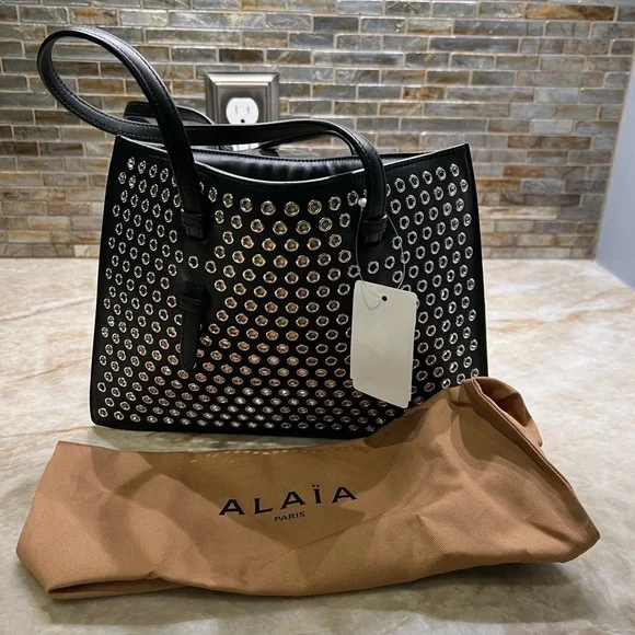 ALAÏA Mina Small perforated leather tote bag - Picture 4 of 14